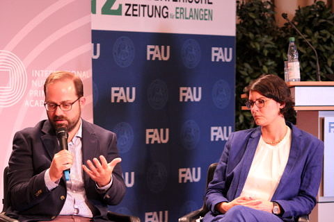 Andreas Schüller und Prof. Dr. Anuscheh Farahat